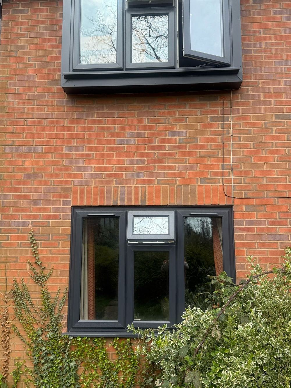 3-section Rehau Total 70 casement window, white uPVC frame on front elevation